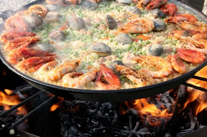 Paella cooked outdoors for a crowd